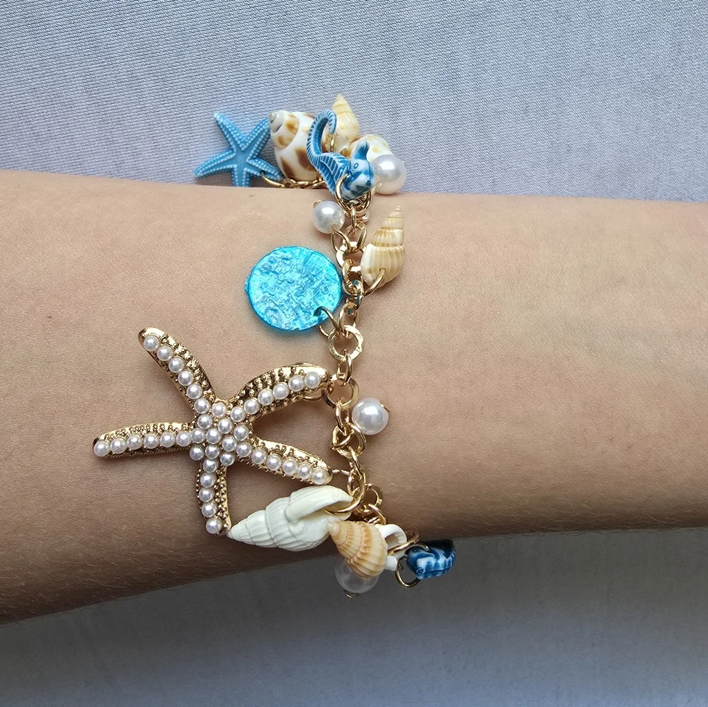 Ocean-Themed Charm Bracelet with Blue‎ and Gold Color Accents